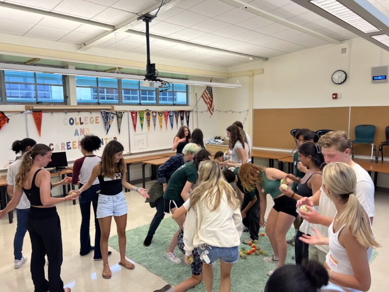 CTE Pathway Ambassadors take prospective middle school CTE students through a critical thinking/team building exercise.